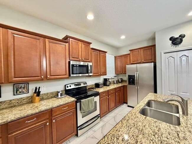 Building Photo - 8894 Candy Palm Rd