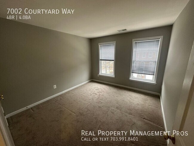 Building Photo - 7002 Courtyard Way