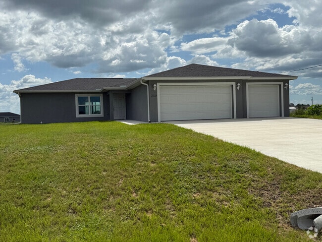 Building Photo - 7038 Lotus Cir