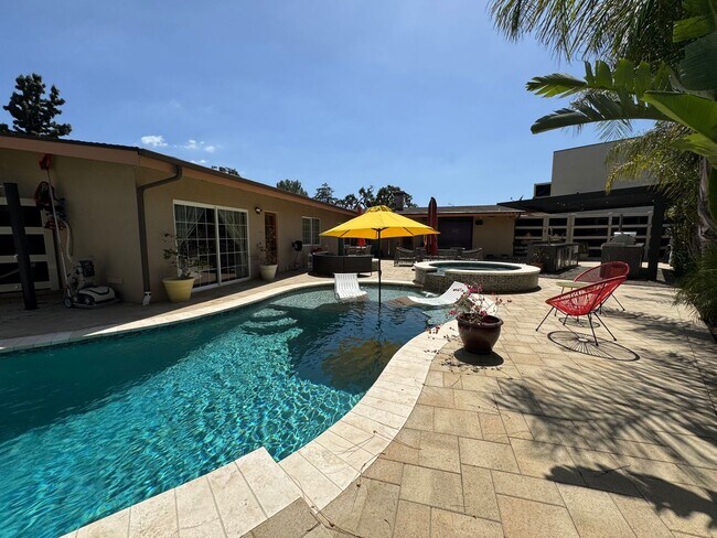 Building Photo - Luxurious Oasis with Resort-Style Pool and...