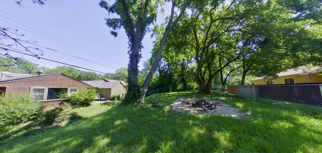 Building Photo - 3D Tour Available! West Side Home + Sunroom + Attached Garage + Pets Welcome + Washer & Dryer!  A...