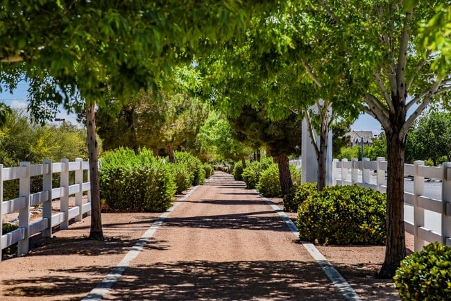 Building Photo - Single Story w/ duel primary suites gated ...