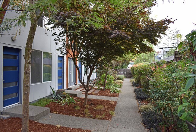 Courtyard - Private Entrances - Bleu Apartments