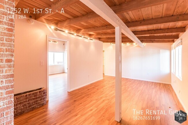 Building Photo - Spectacular 2 Bedroom W/ Exposed Beams & B...