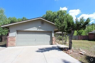 Building Photo - MOVE IN READY! Spacious 4-Bedroom Coconino...