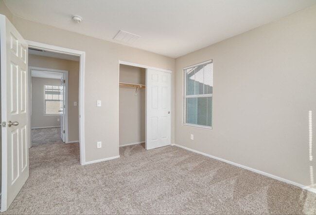 Building Photo - 4-BEDROOM / 3-BATH 2-STORY LOVELY HOME WITHIN GATED COMMUNITY CLOSE TO NELLIS AIR FORCE BASE!
