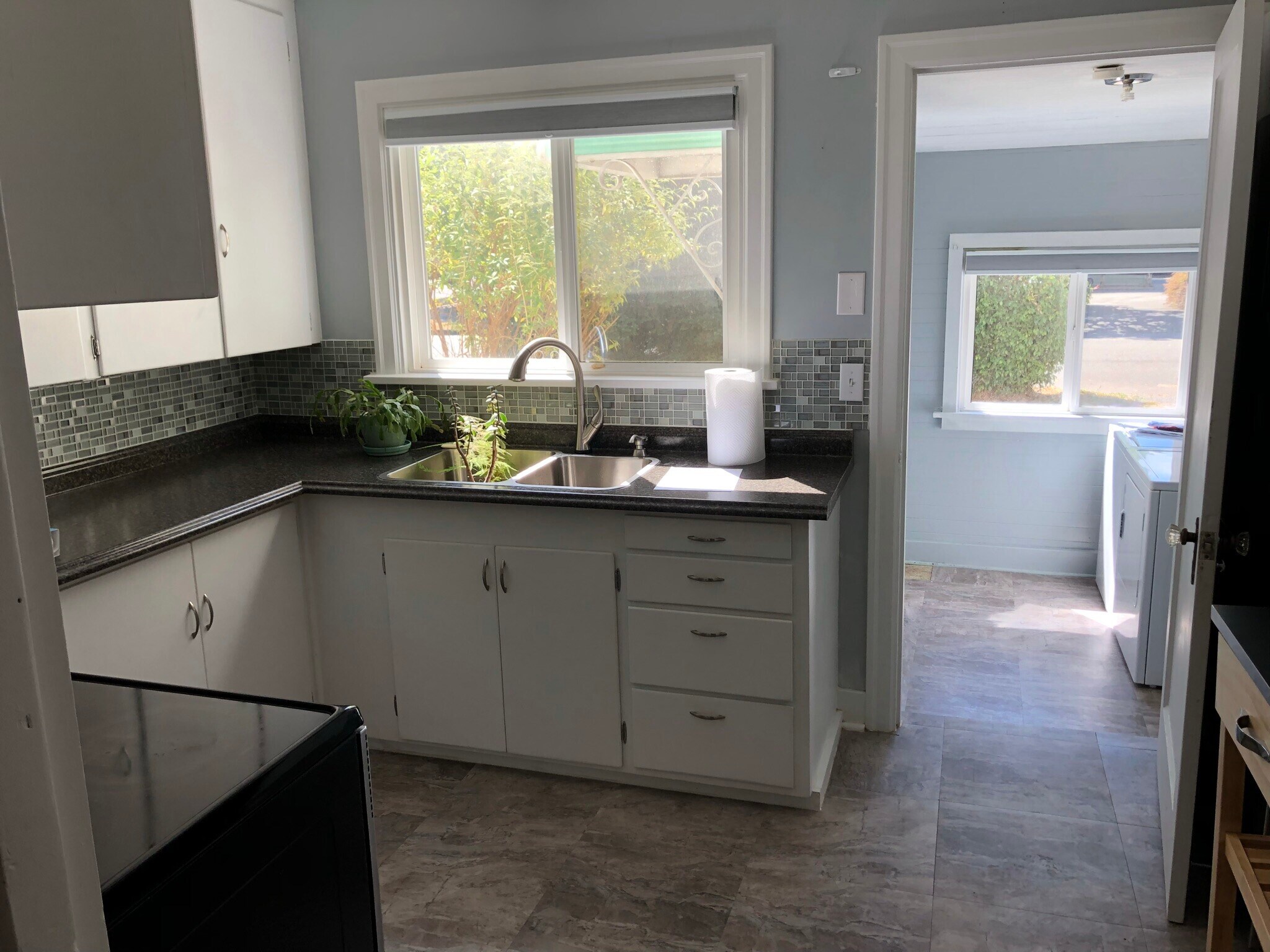 Kitchen with laundry room behind it - 1420 6th Ave SW
