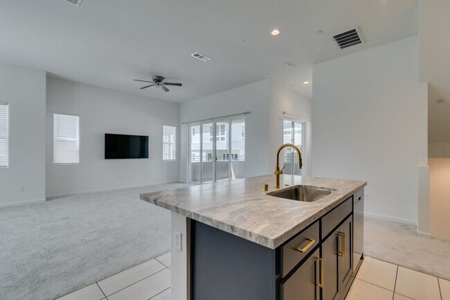 Building Photo - Stunning 4-Level Townhome in Inspirada | R...