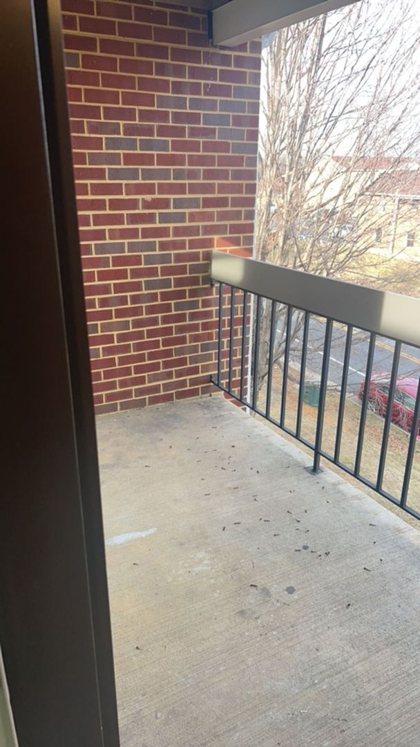 Building Photo - Fun and Stylish Living at Madison Manor! Top-Floor Condo with Vaulted Ceilings and Skylights