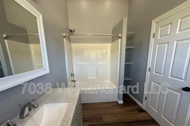 Building Photo - 7038 W Blanchard Rd