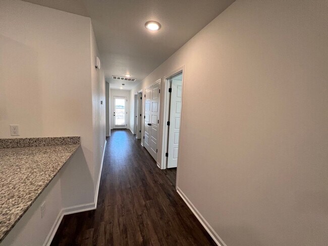 Building Photo - New 3 Bedroom Townhome ($999 Per Month)