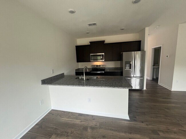 Building Photo - Brand New Townhome – Modern Comfort & Conv...