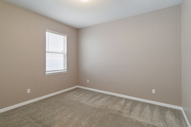 Building Photo - Gorgeous Energy Efficient 4/2 Home in Gated Community Close to Lake Nona