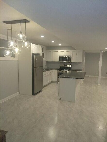 Building Photo - 6042 S Kolmar Ave