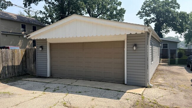Building Photo - Riverfront Living on the Fox: 2 Bed, 1 Bath with Private Dock and Oversized Garage