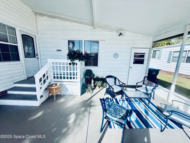 Building Photo - 2399 Coconut Palm Dr