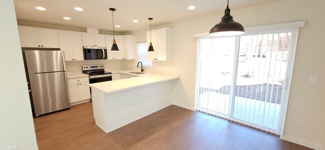 Building Photo - Brand New Three-Bedroom Townhomes, 1/2 a m...