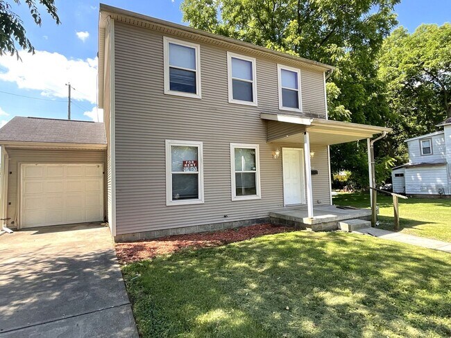 Building Photo - For Rent - 4 Bedroom, 2 Full Bath Home with Ground-Floor Bedroom, Attached Garage and Brand-New K...