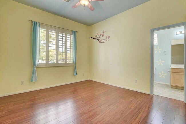 Bedroom 3 with very large window outside view - 3034 Constable St