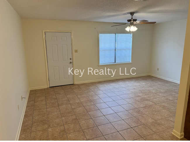 Building Photo - 6014 Quail Ridge