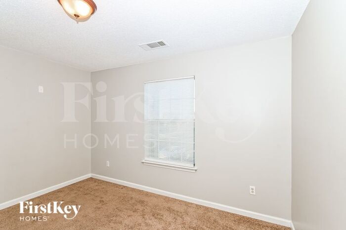 Building Photo - 7678 Breeze Wood Cove