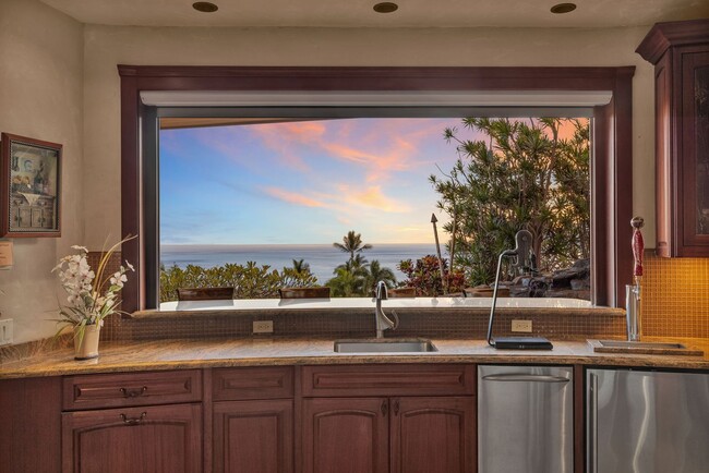 Building Photo - Island Elegance: 4-Bedroom Luxury Retreat with Infinity Pool