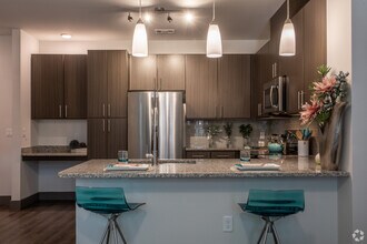 Building Photo - 1st Month FREE – Limited-Time Leasing Spec...