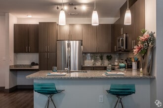 Building Photo - 1st Month FREE – Limited-Time Leasing Spec...
