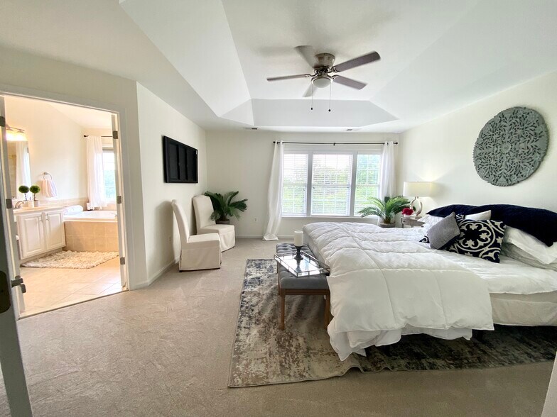 New Carpet/ Upper and Lower Levels - 810 Revelstore Ter NE