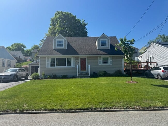 Building Photo - Sunny, Modern Mid-Century Cape 4 BR Spacio...