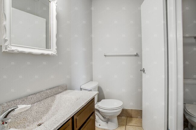 Building Photo - **Spacious 3-Bedroom Townhome with Partially Finished Basement and Off-Street Parking**