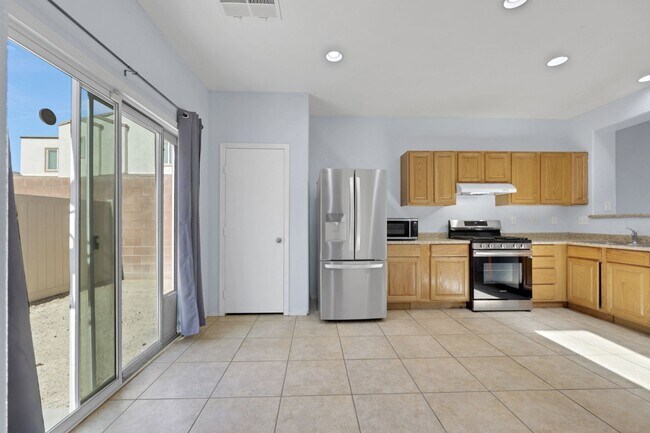 Building Photo - Updated Two-Story 3 bed/2.5 bath Home with Open Kitchen, Attached 1 Car Garage & Modern Flooring ...