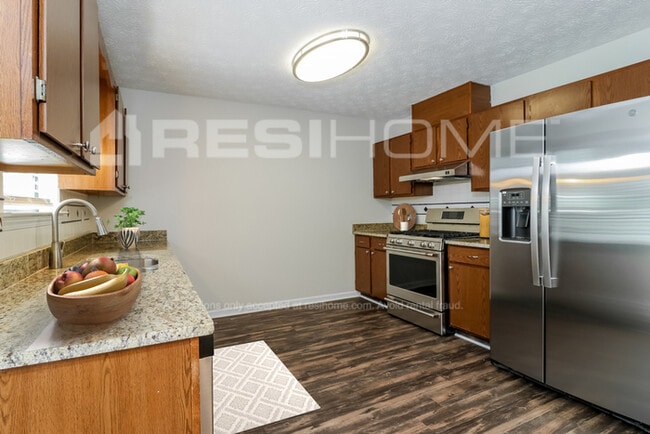 Building Photo - 2402 Range Heights Terrace
