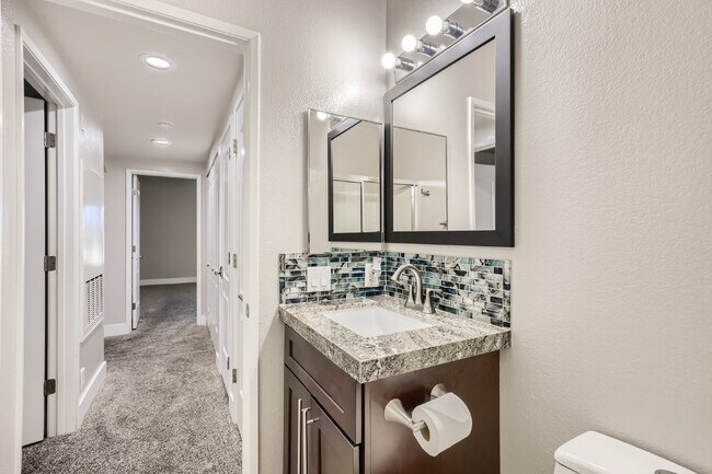 Building Photo - Discover this spacious and well-appointed 2-bedroom + office/den, 2-bath condo located in the hig...