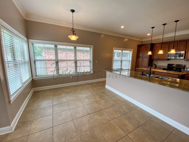 Building Photo - Family Home in Lafitte Landing – Fenced Ya...