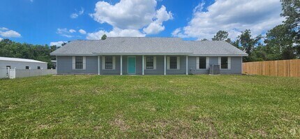 Building Photo - Charming 3-Bedroom Home in Deland – Water ...