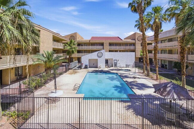 Building Photo - Top-floor studio apartment! Recently renovated with brand new flooring and paint throughout.