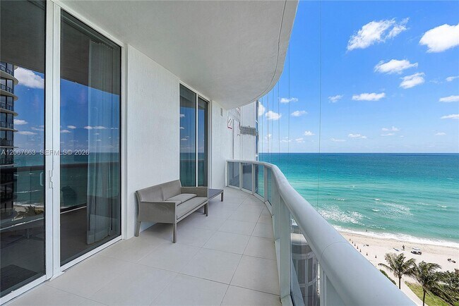 Building Photo - 15811 Collins Ave
