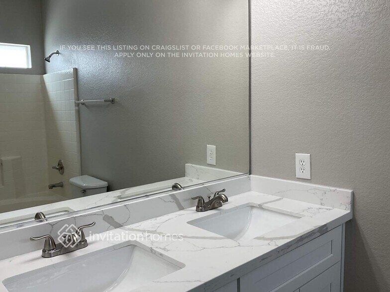 Building Photo - 8861 Happy Stream Ave