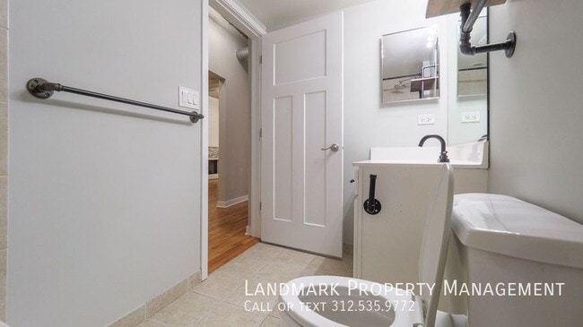 Building Photo - 1069 W 14th Pl