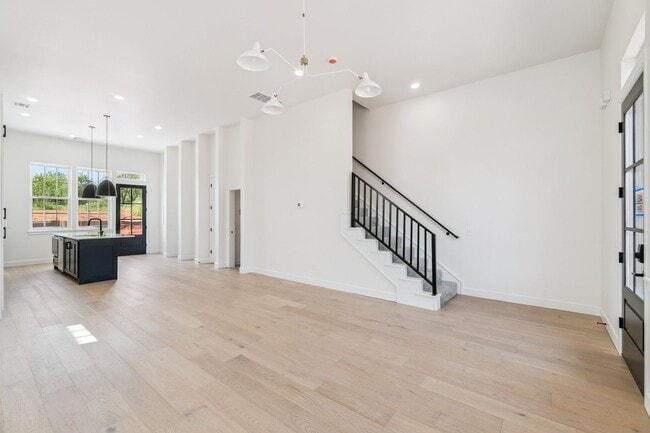 Building Photo - Minimalist Magic: 2-Bed Apartment Over Sel...