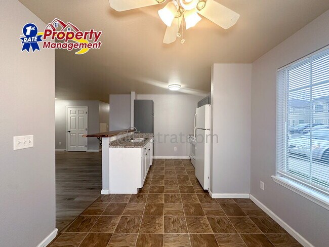 Building Photo - 10042 W Garverdale Ln