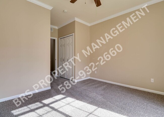 Building Photo - Ground Floor 2 BR, 2 BA condo with attached garage