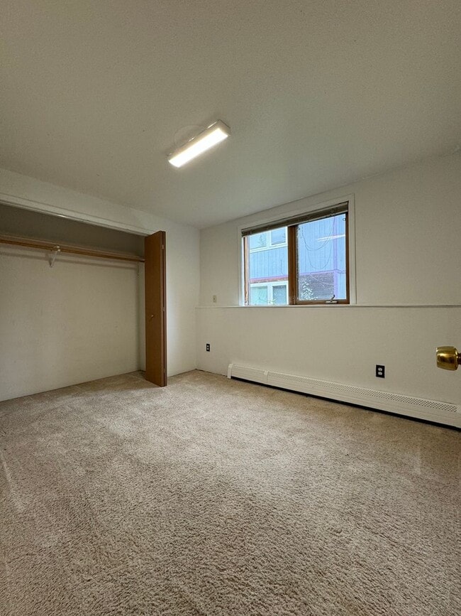 Building Photo - 3 Bedroom 1 -1/2 Bath Lower Apartment with a Shared Garage