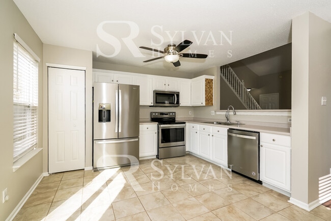 Building Photo - Turn the key. Enter. Smile. Repeat every day!