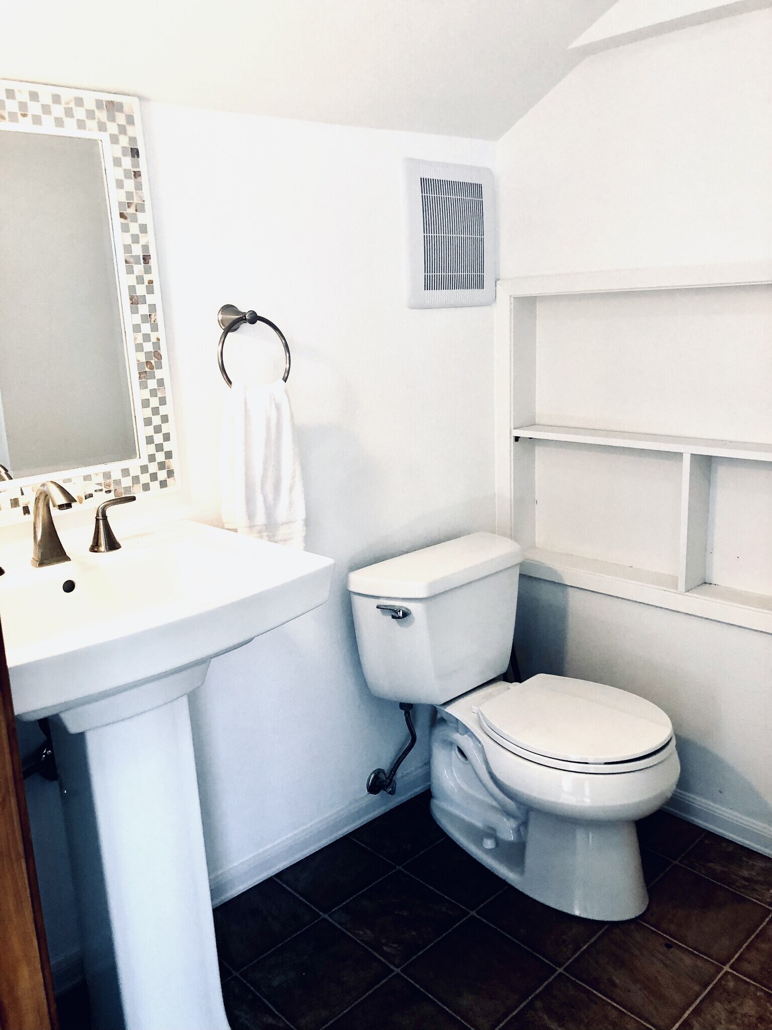 The upstairs bedroom bath includes a shower - 7107 120th St NW