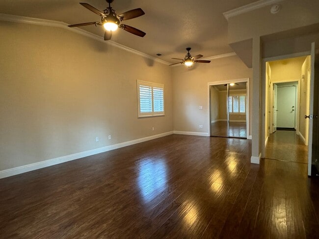 Building Photo - Immaculate home with pool & hardwood floors!
