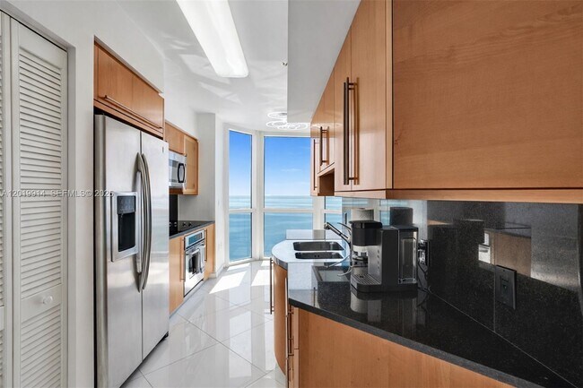 Building Photo - 6365 Collins Ave