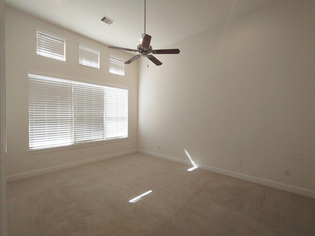 3rd floor master bedroom with 14 foot ceilings - 3406 La Branch St
