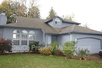 Building Photo - 1587 NE 57th Ave